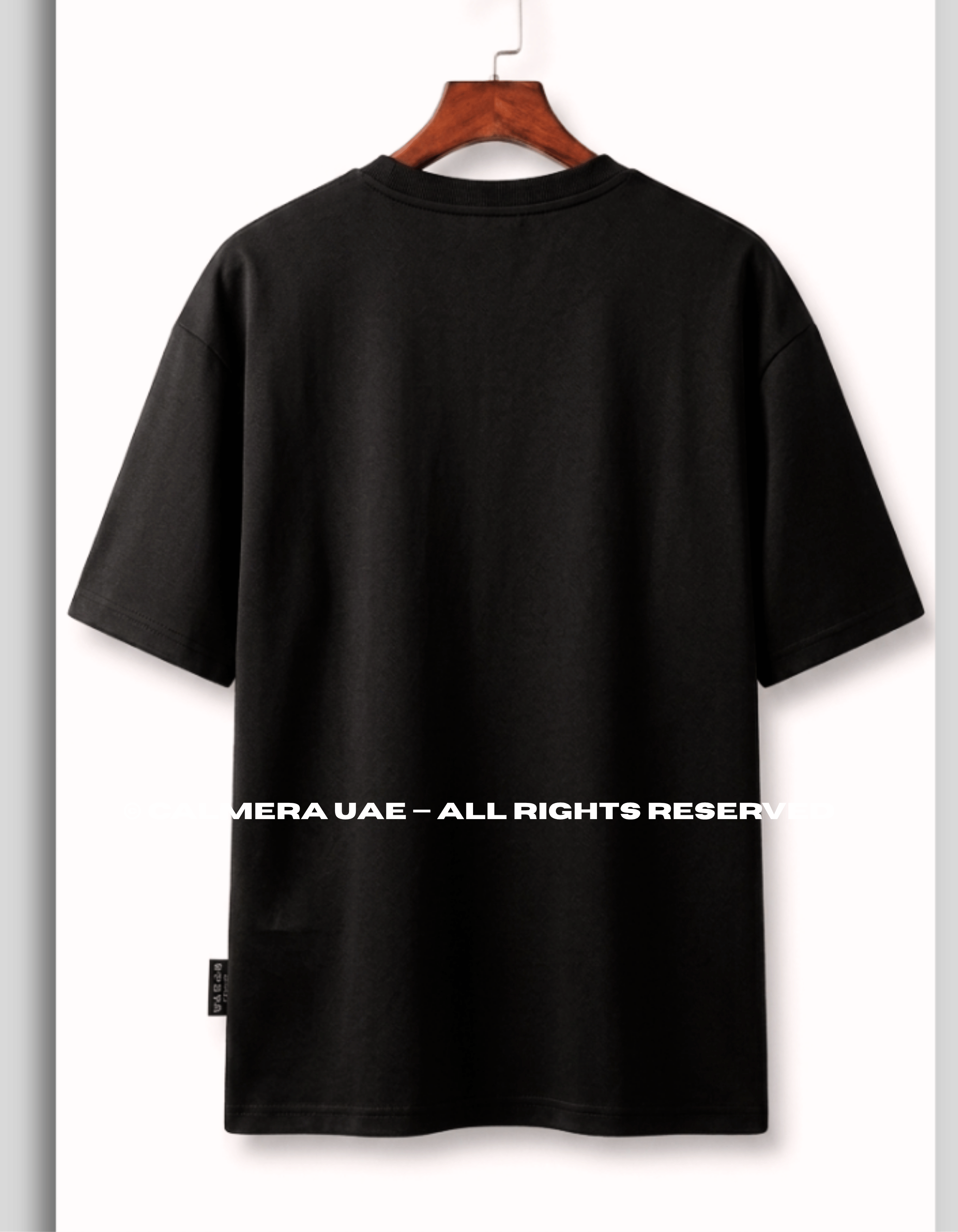 Calmera Minimalist Embossed Oversized T-Shirt – Pitch Black