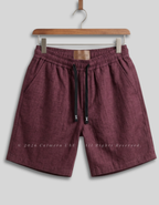 Calmera men's maroon linen drawstring shorts front view on hanger