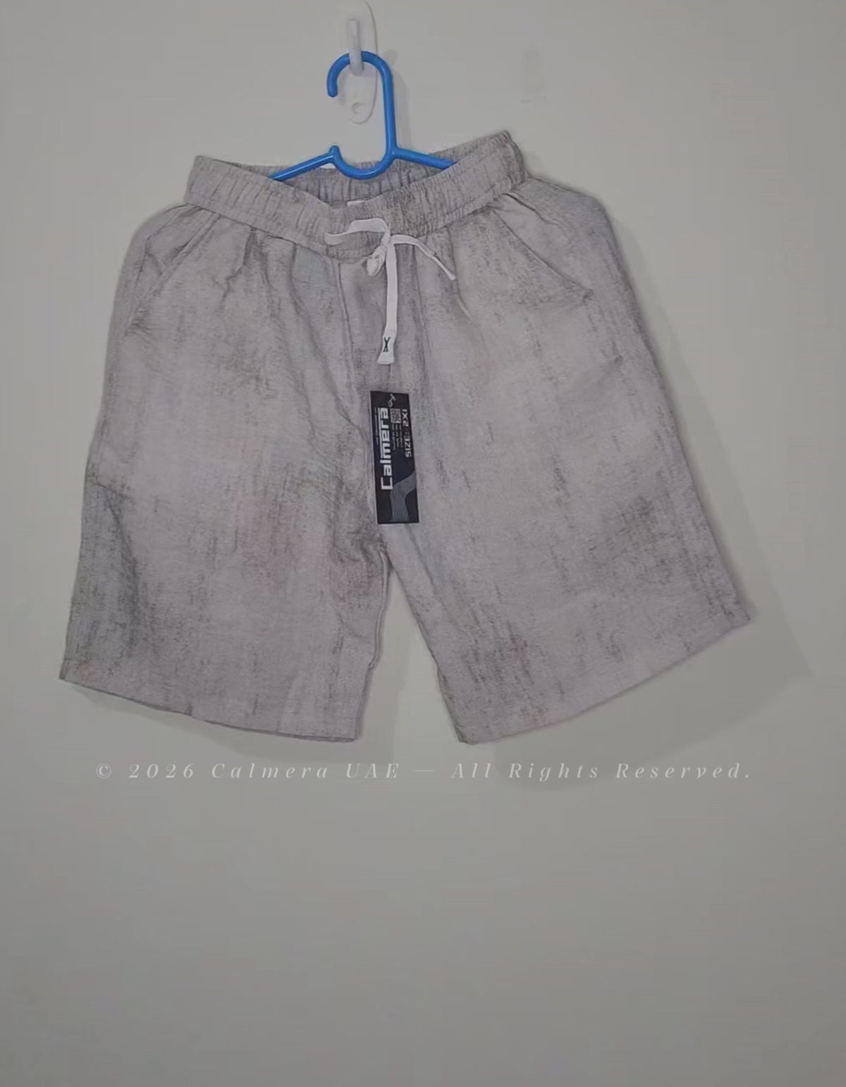 Video demonstration of Calmera linen-blend shorts fit and fabric texture